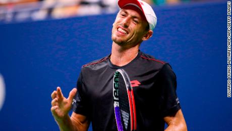 Millman reacts after losing a point to Djokovic during their quarterfinal match.