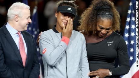 Naomi Osaka (center) was in tears during the presentation ceremony.