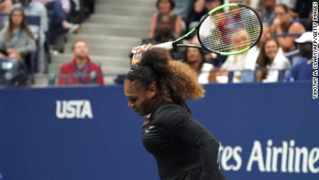 Serena Williams of the US smashes her racquet while playing against Naomi Osaka of Japan during their Women&#39;s Singles Finals match at the 2018 US Open at the USTA Billie Jean King National Tennis Center in New York on September 8, 2018. 