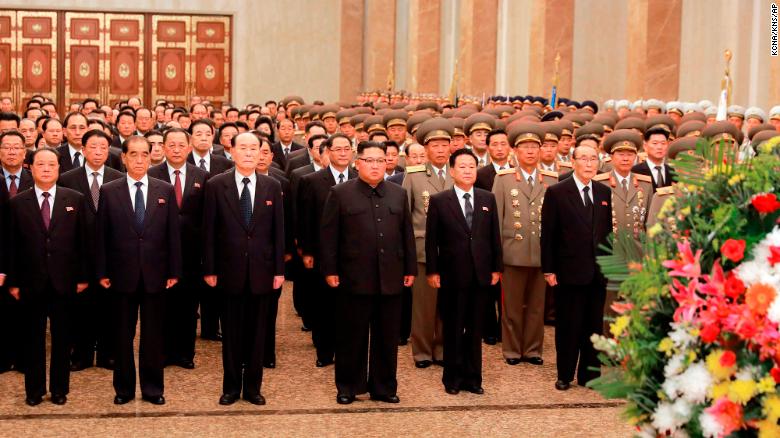 In this photo provided Sunday by the North Korean government North Korean leader Kim Jong Un center visits the Kumsusan Palace of the Sun in Pyongyang North Korea. Independent journalists were not given access to cover the event depicted in this image distributed by the North Korean government. 