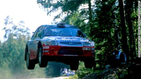 Former rally world champion, Juha Kankkunen of Finland, jumps during the Neste rally in 2001.