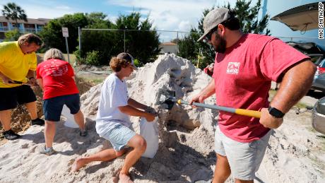 Residents of the Isle of Palms, South Carolina, fill sandbags in preparation for Hurricane Florence.