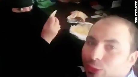 Saudi authorities have arrested an Arab man who appeared in an &quot;offensive video&quot; having breakfast with a female colleague at work.