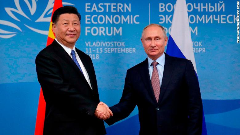 Russian President Vladimir Putin (R) meets Chinese counterpart Xi Jinping on the sidelines of the Eastern Economic Forum in Vladivostok on September 11, 2018. 