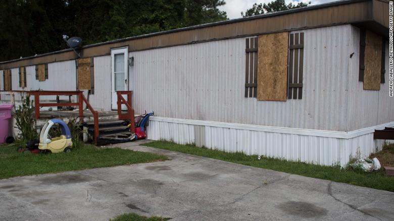 The windows of a mobile home in Wilmington, North Carolina, were boarded up by a family that evacuated Wednesday.
