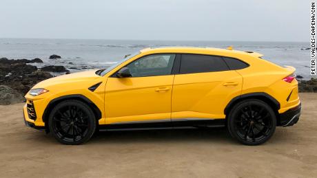 The vents behind the front wheel are a visual reference to Lamborghini's first SUV.