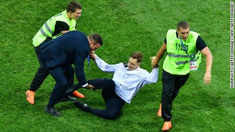 Verzilov is removed from the field after protesting at the 2018 World Cup Finals in Moscow.