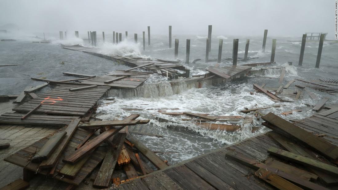 Powerful winds and waves destroy portions of a boat dock and boardwalk in Atlantic Beach on September 13.  