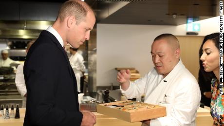 Chef Akira Shimizu presents his signature bento box to Prince William.