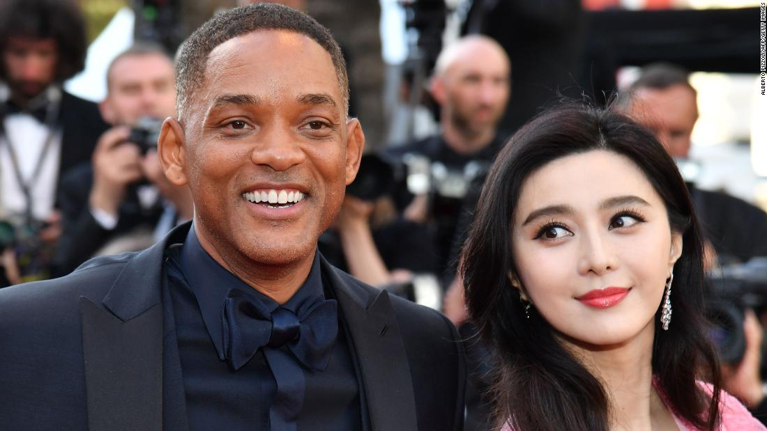 US actor Will Smith (L) and Chinese actress Fan Bingbing pose as they arrive on May 23, 2017 at the Cannes Film Festival in France.