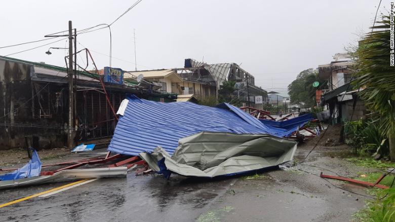 Super Typhoon Mangkhut rips the roof off a building in Pasuquin, Ilocos Norte.