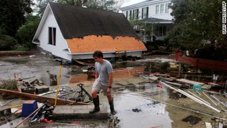 Joseph Eudi surveys flood debris and storm damage from Hurricane Florence at a home in New Bern, North Carolina, on Saturday.