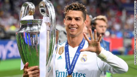 Cristiano Ronaldo celebrates his fifth Champions League trophy after beating Liverpool last season.