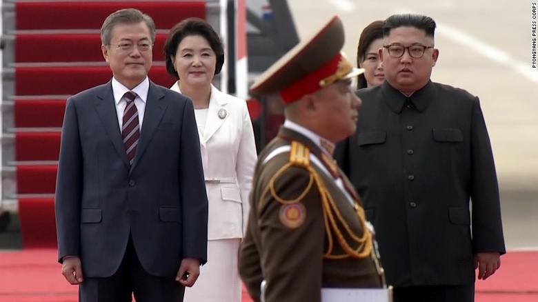 South Korean President Moon Jae-in, left, and North Korean leader Kim Jong Un, right, are seen in Pyongyang shortly after Moon's arrival. 