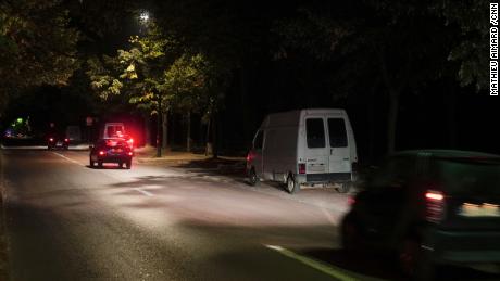 By night, prostitutes work from vans parked at the roadside in the park.