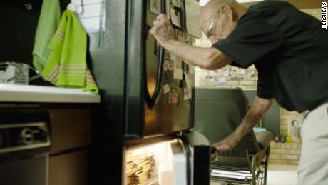 Bob Williams keeps hundreds of chocolate bars in his freezer so that he can give them out to people each day.