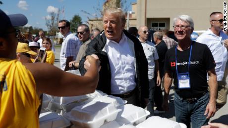President Donald Trump visits the Temple Baptist Church, where food and other supplies are being distributed during Hurricane Florence recovery efforts, Wednesday, Sept. 19, 2018, in New Bern, N.C. (AP Photo/Evan Vucci)