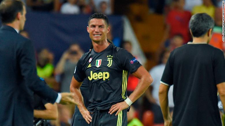 Cristiano Ronaldo leaves the field with tears in his eyes after being sent off during his Champions League debut for Juventus in Valencia. 