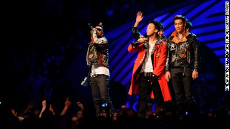 G-Dragon, Taeyang, T.O.P, Daesung and Seungri of Korean band Bigbang receive the Best Worldwide Award during the MTV Europe Music Awards 2011 live show.
