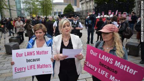Bernadette Smyth of Precious Lives holds a counter-protest as women call for an end to restrictive abortion laws in Belfast in May.