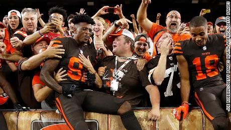 Cleveland Browns&#39; players celebrate with their fans after Thursday&#39;s win.