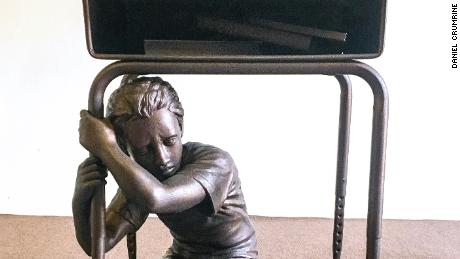 A bronze-coated statue based on the Parkland shooting has a message for voters.