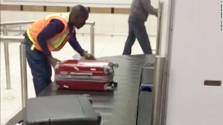 Airport baggage handler goes viral - CNN Video