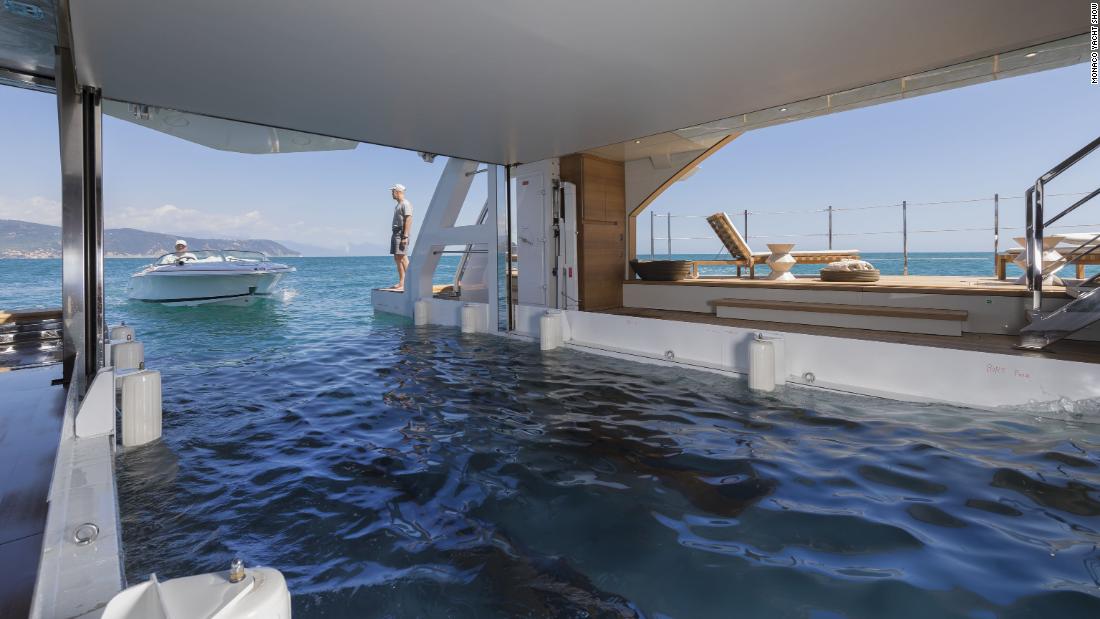 Seven Sin features a float-in tender garage which also transforms into a beach club -- which has fold-down side balconies and is fully equipped with a gym and sauna.