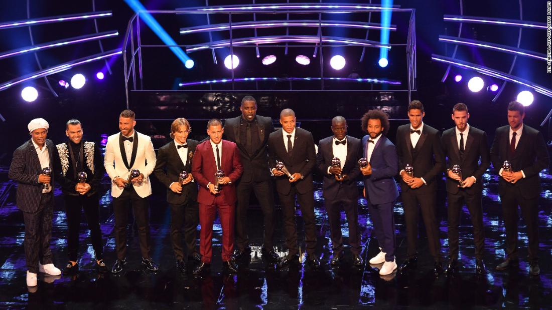 The FIFPro World XI awards were presented by former Brazil and Barcelona player Ronaldinho (far left) and Brazil and PSG defender Dani Alves (second to left). 