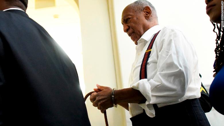 See Bill Cosby leave court in handcuffs