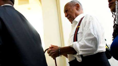 Bill Cosby is taken away in handcuffs after he was sentenced to three-to 10-years for felony sexual assault on Tuesday, Sept. 25, 2018, in Norristown, Pa.  (Mark Makela/Pool Photo via AP)