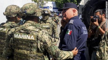 police mexican acapulco marines force control investigation under over cnn authorities bbc links soldiers drugs take suspicion corruption seize officers