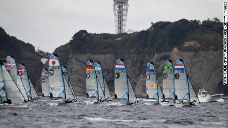 Athletes compete during the sailing World Cup series, a test event of the Tokyo 2020 Olympic Games, in the waters off Enoshima island on September 12, 2018.