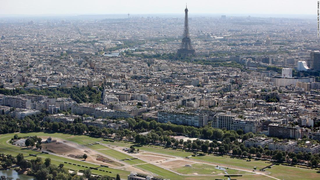 An aerial photograph of Longchamp showing Paris and the Eiffel Tower in the distance. The racecourse has undergone a $145M revamp.