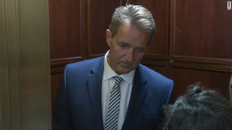 Tearful woman confronts Sen. Flake on elevator