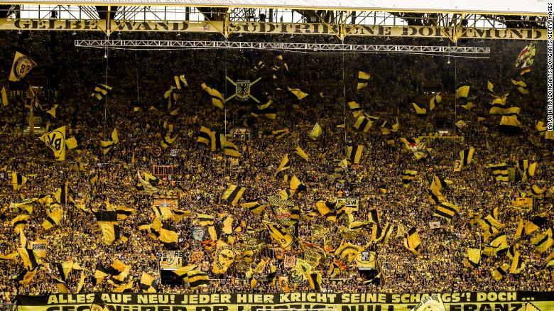 Borussia&#39;s Dortmund&#39;s Westfalenstadion Stadium is known for its &quot;Yellow Wall.&quot; The south stand is packed full of impassioned fans who together create one of the most spell-binding sights in football. Dressed in the team&#39;s yellow and black, supporters create an intimidating atmosphere for the opposition.   