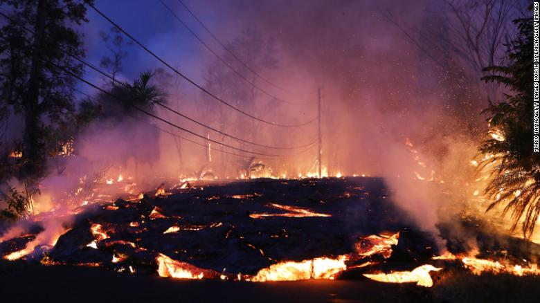 Lava from a Kilauea volcano fissure advances up a residential street in Leilani Estates, Hawaii, on May 27.