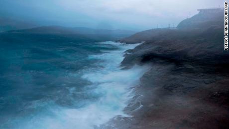 Waves crash on rocks near the port town of Lavrio south of Athens, on Thursday, Sept. 27 