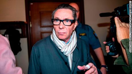 Jean-Claude Arnault, whose wife is a member of the Swedish Academy, arrives at the district court in Stockholm on September 19, where he faced allegations of rape and sexual assault.