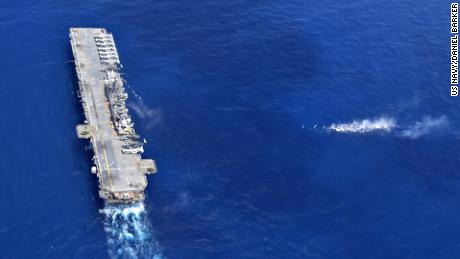 The amphibious assault ship USS Wasp performs maneuvers on Thursday, September 27.