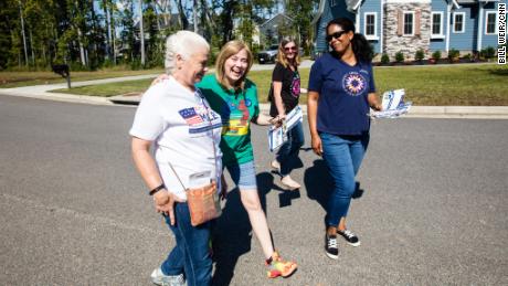 Kim Drew Wright, second from left, found friends as well as fellow campaigners in her neighborhood.