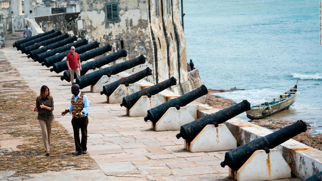 Museum educator Kwesi Essel-Blankson and first lady Melania Trump tour the Cape Coast Castle, one of dozens of hubs in the trans-Atlantic slave trade.