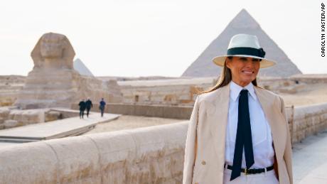 First lady Melania Trump visits the ancient statue of Sphinx, with the body of a lion and a human head, at the historic site of Giza Pyramids in Giza, near Cairo, Egypt, Saturday, Oct. 6, 2018. (AP Photo/Carolyn Kaster)