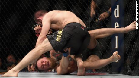 Nurmagomedov chases down McGregor during their UFC lightweight championship bout.