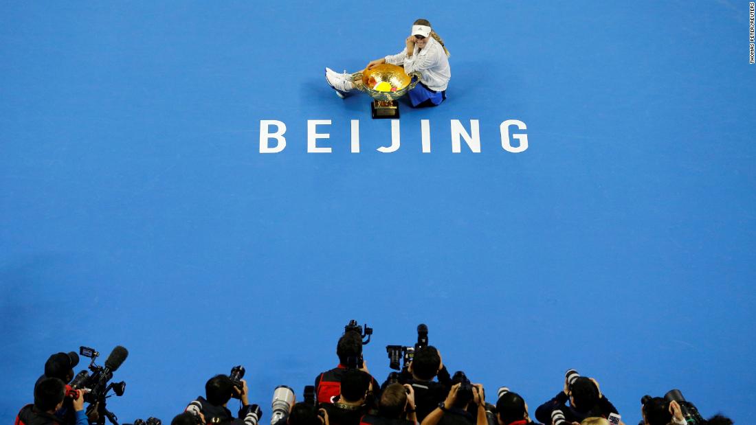 Caroline Wozniacki of Denmark poses with her trophy after defeating Anastasija Sevastova of Latvia during the women&#39;s singles finals at the China Open on October 7, 2018.