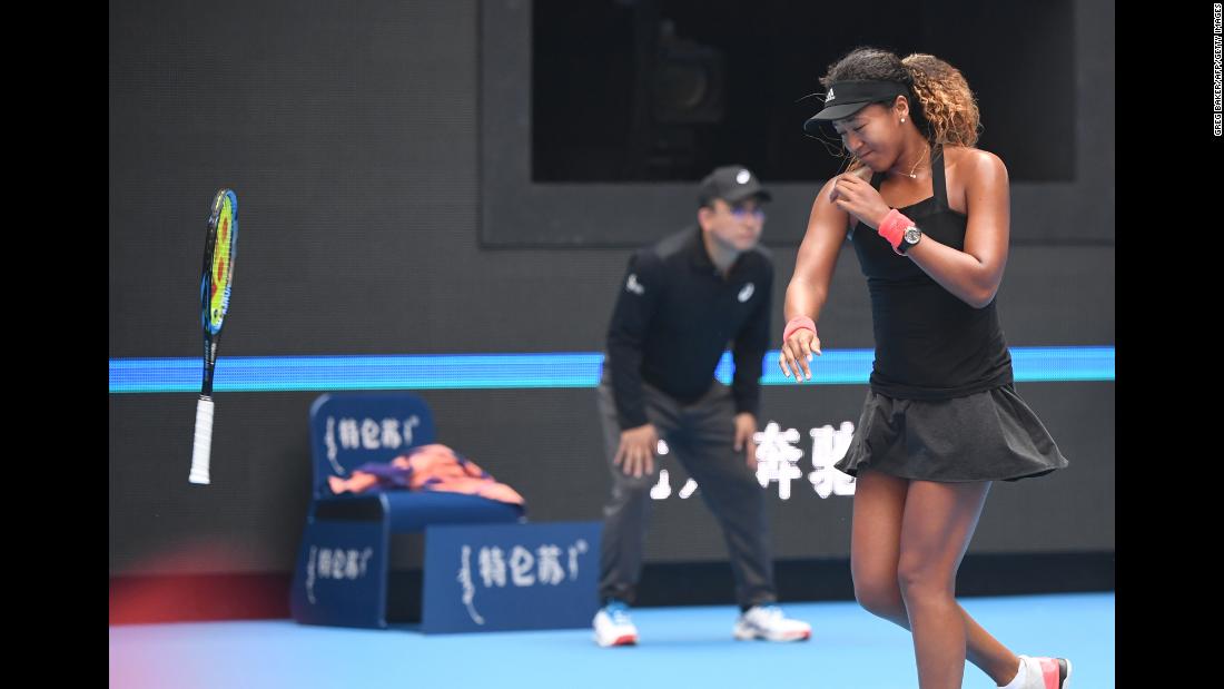 Naomi Osaka of Japan throws her racquet during her women&#39;s quarter-final match against Zhang Shuai of China at the China Open tennis tournament in Beijing on October 5, 2018. Osaka advanced to the semi-finals where she was defeated in two sets by Anastasija Sevastova.