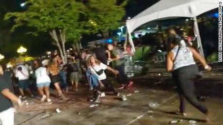 Rap fans flee a Lil Wayne concert in Atlanta.