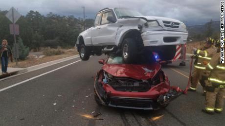 car arizona truck crash pickup collision accident lands hurt prescott mazda injured hollywood nobody az horrible cr honda flips belts