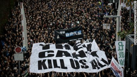 Protesters display a large banner during a rally in March 2014 after attacks on journalists. The city has long had a strong commitment to press freedom. 