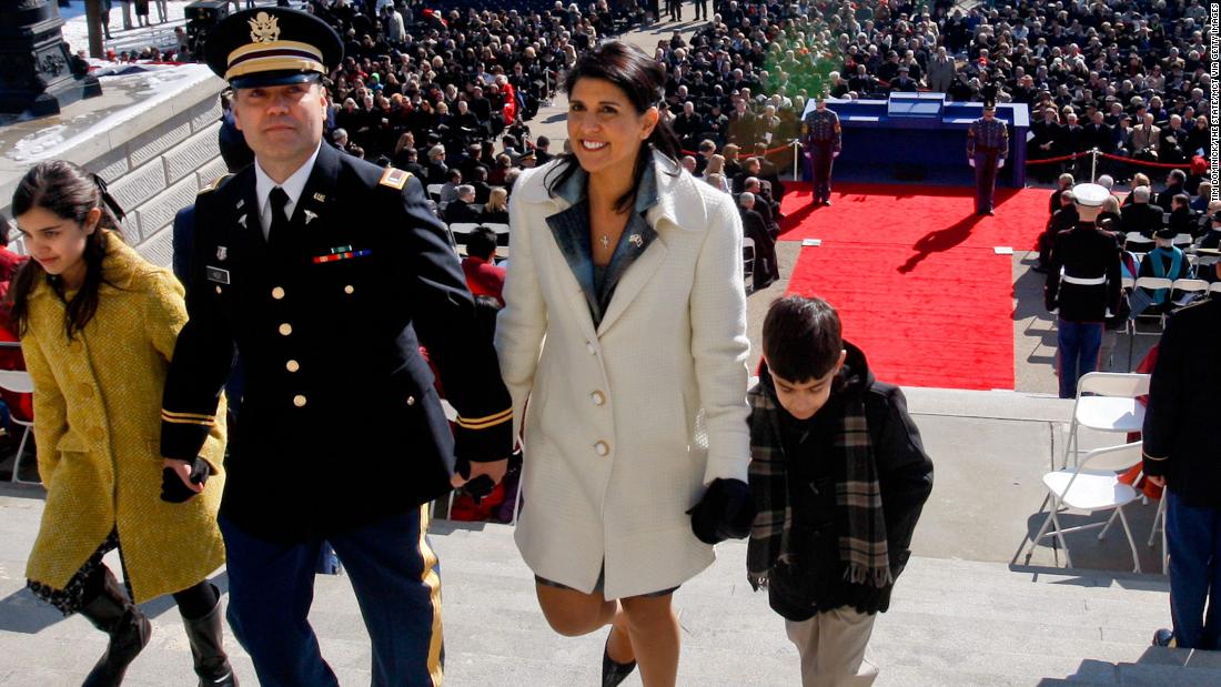 Haley and her family walk back into the South Carolina State House after her inauguration in 2011.